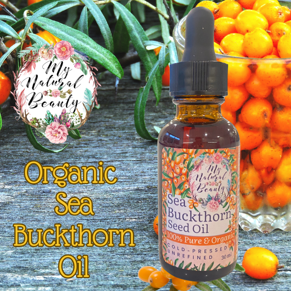 Bottle of organic sea buckthorn seed oil with sea buckthorn berries in the background.
