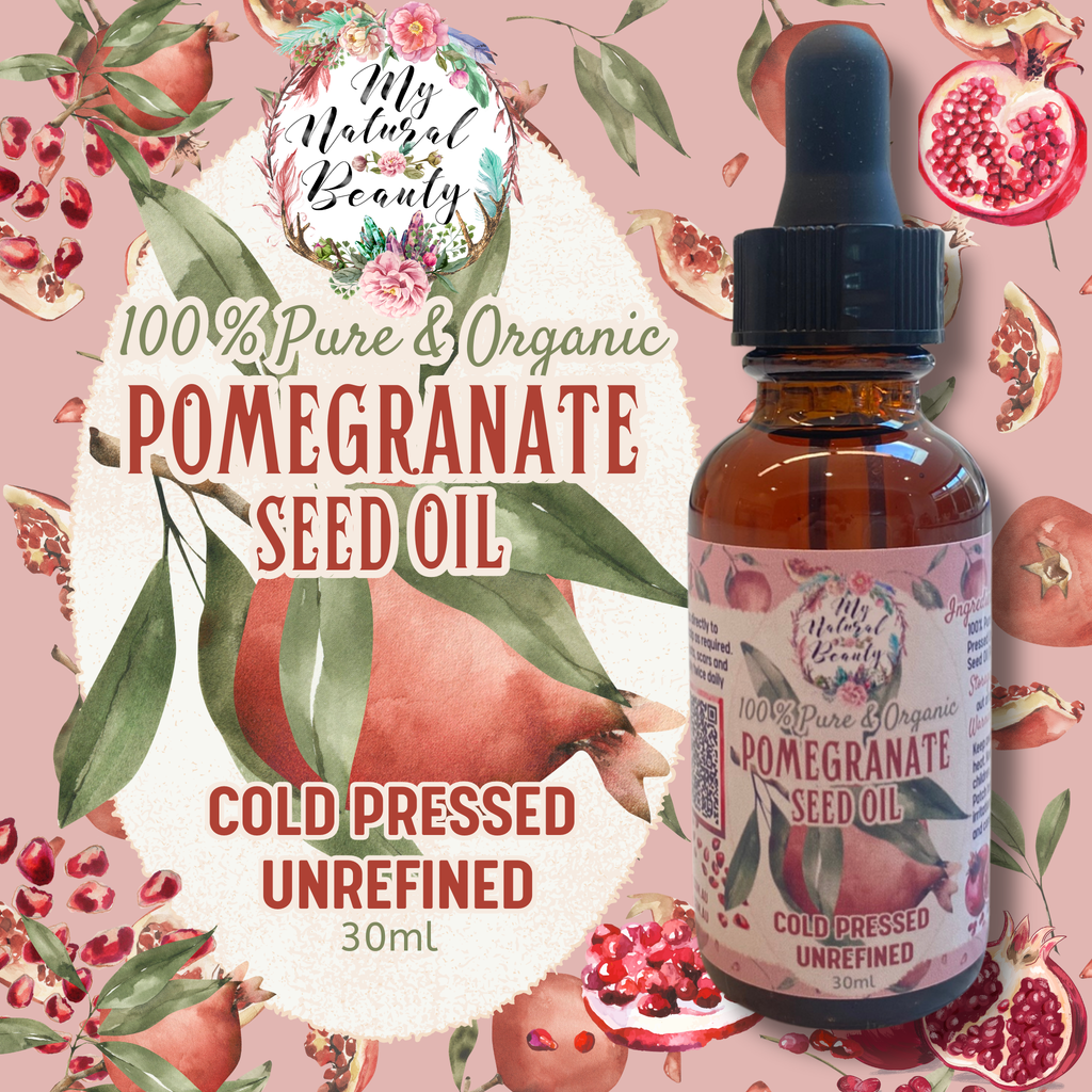 Bottle of pomegranate seed oil with a floral and fruit-themed background